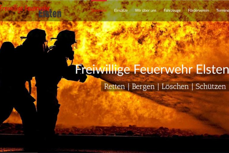 Zwei Feuerwehrleute bekämpfen ein großes Feuer, im Hintergrund lodern Flammen. Text: Freiwillige Feuerwehr, Retten | Bergen | Löschen.